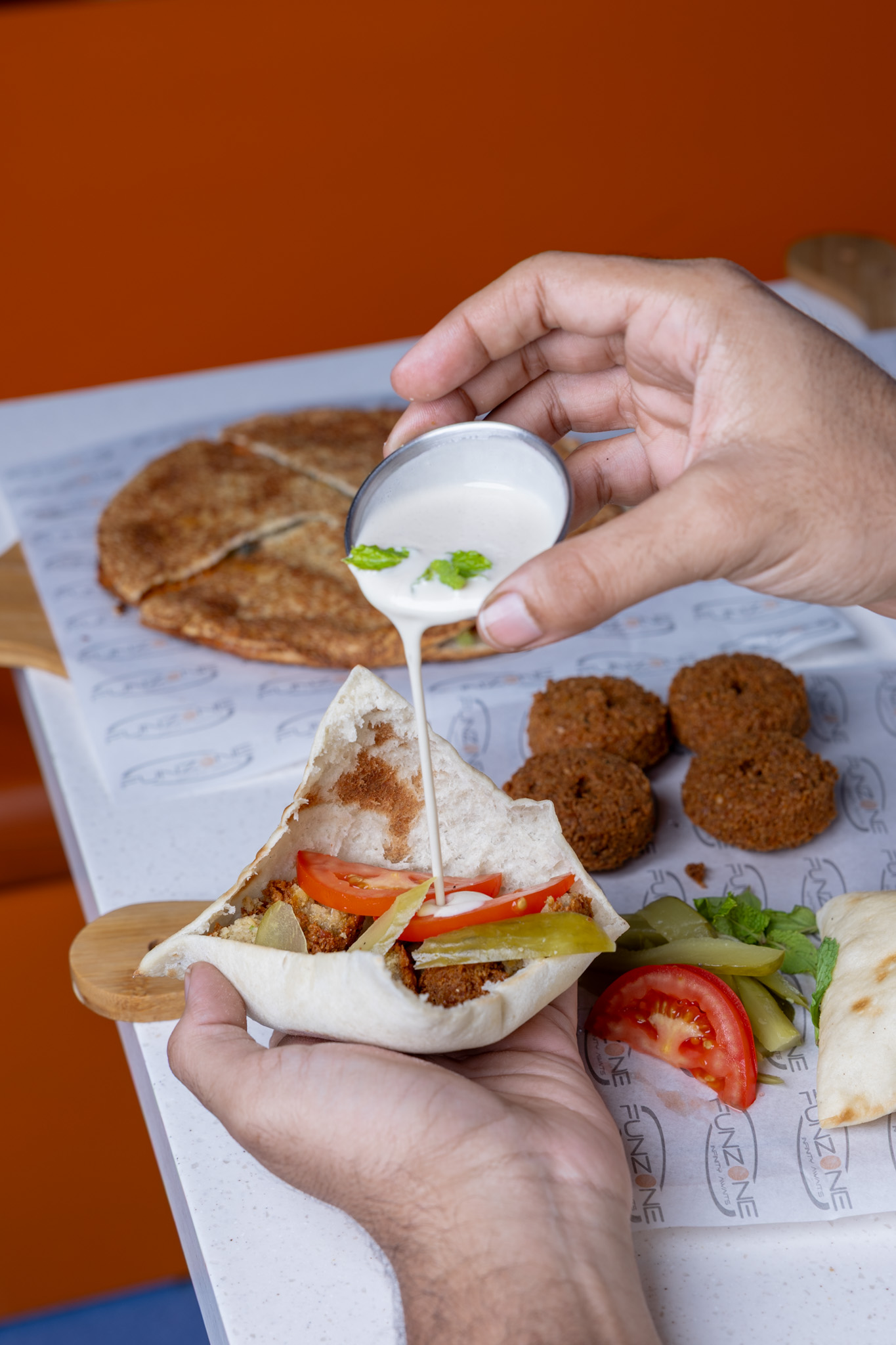 Burger - pizza - manakish - french fries - coffee - fresh and delicious fast food